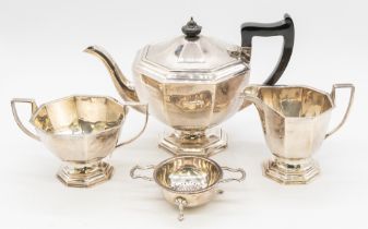 A matched Queen Elizabeth II silver three piece tea set consisting of tea pot with black celluloid