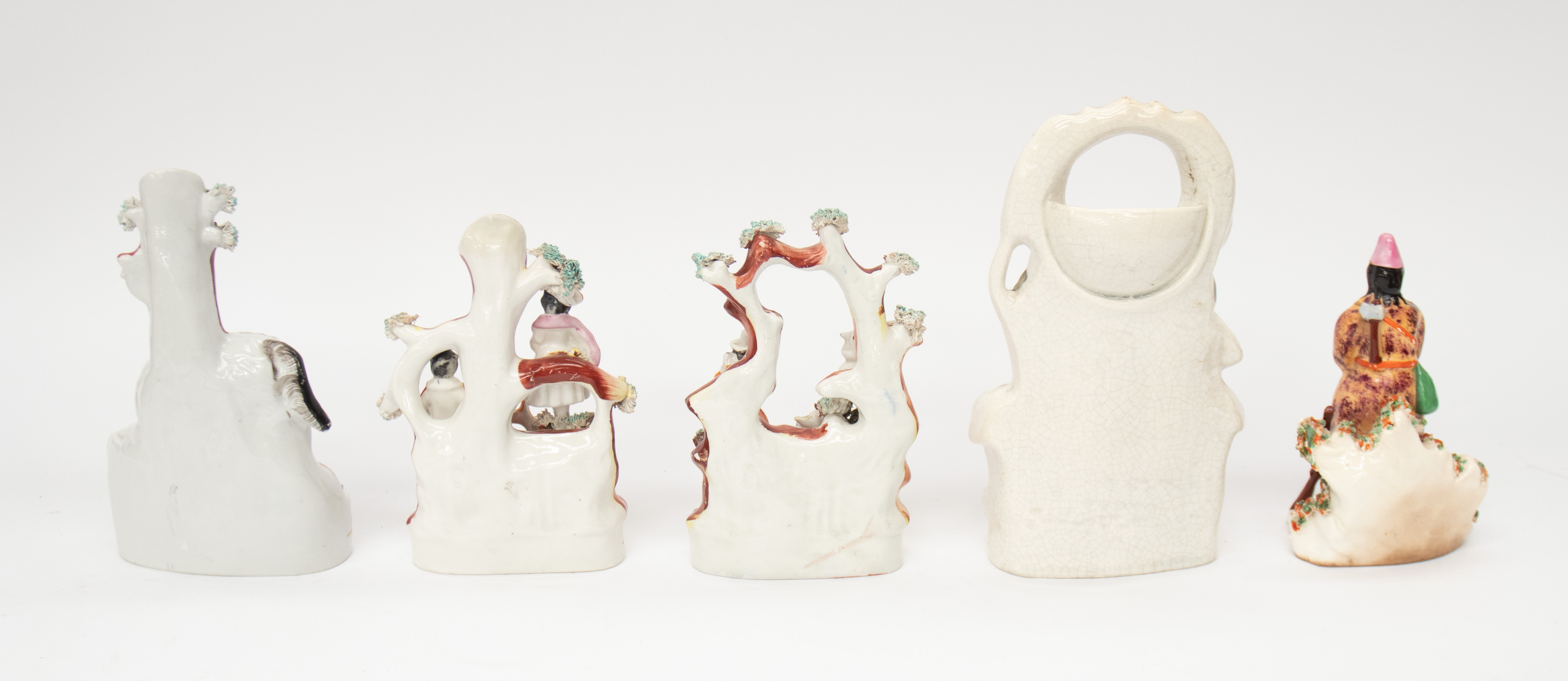 Five Staffordshire figures to include; A laying lady and animal posy holder, a single man with - Image 2 of 3
