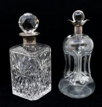 A late Victorian silver collared glass 'glug-glug' decanter, hallmarked by Hukin & Heath,