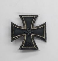 A WW2 German Iron Cross 1st class. A non maker marked example, usual 3 part construction with