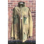 A WW2 era 1943 dated 1st Pattern Denison paratrooper’s smock. Later privately tailored, possibly