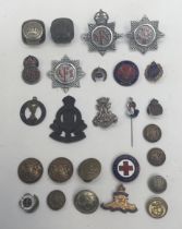 A selection of WW1 / WW2 badges and uniform accessories. To include: 2 WW1 German belt hook, with