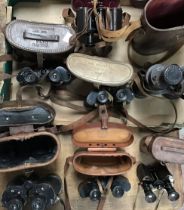 A collection of Military cased binoculars, including WW2 Barr & Stroud 7x broad arrow marked with