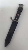 An early 1st type German Hitler youth knife with associated scabbard. Standard nickel plated