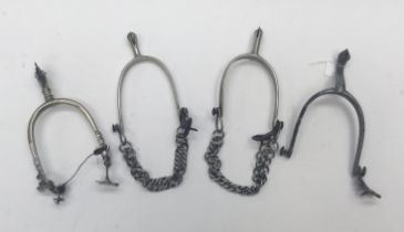 A selection of vintage metal spurs. To include: a matched nickel pair, with retaining buckle and