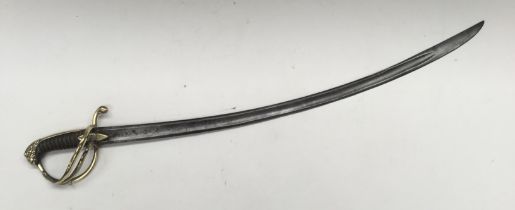 A 19th century cavalry sabre, likely French in origin. Brass 3 bar guard, with brass quillon,