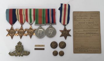 A set of WW2 medals, plus loose badges and buttons. To include, a group mounted on a bar for wear