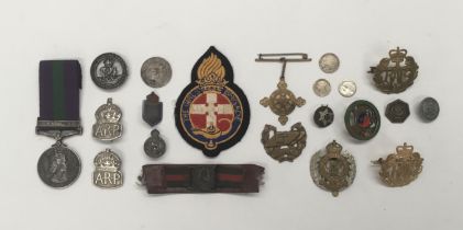 A selection of WW1, WW2, and later military and home front related items. To include: a 1918-62