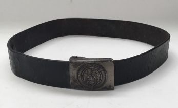 A WW2 era Hitler Youth buckle and original leather belt. National eagle symbol with HJ diamond to