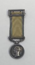 An original mid 19th century Crimean War era miniature Royal Navy Baltic medal and ribbon.