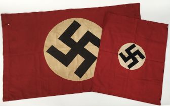 2 WW2 era doubled sided German flags, both with screen printed white roundels, which in turn are