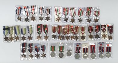 A large selection of WW2 British medals / stars, including a Canadian issue sterling silver