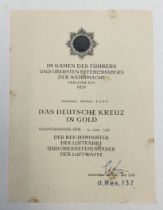 A scarce original WW2 era award document for the German Cross in gold. A printed document with