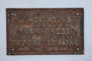 A GWR "Please Adjust Your Dress Before Leaving" notice, from Ledbury station on the Worcester to