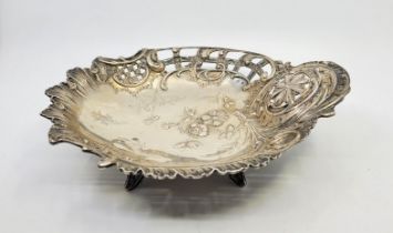 An Austro-Hungarian silver dish, having domed and pierced circular handle to one end, with partially