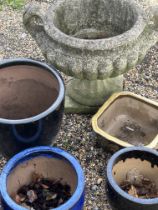 A collection of 20th cent reconstituted garden pots