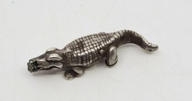 Antiquities: An Egyptian miniature silver crocodile amulet, possibly early to middle Roman period