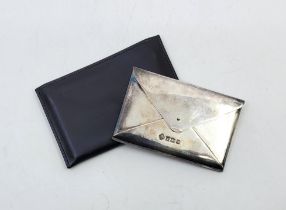 A silver business card case, by Asprey & Co Ltd, Birmingham 1994, fashioned as an envelope, 9cm x