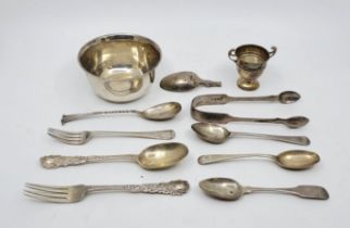 A collection of silver, to include: fiddle pattern sugar tongs, christening fork and spoon, a silver