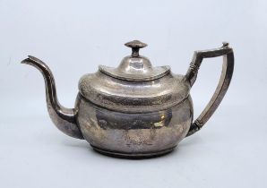 A large George III Irish silver teapot, by maker "IB", Dublin 1805, of oval form, with flush hinge