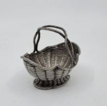 A Victorian novelty silver basket, by Robert Hennell III, London 1864, realistically modelled as a