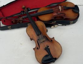 Two antique violins and a bow , one violin made in Dresden  good order no obvious cracks or damages