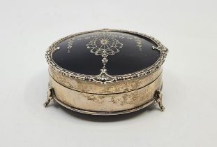 A silver mounted and inlaid tortoiseshell box, by Mappin & Webb Ltd, Birmingham 1919, of circular