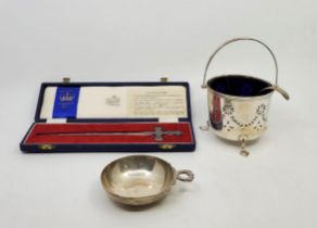 A silver taste du vin, London 1973, makers mark rubbed, with entwined serpents handle, bowl diameter