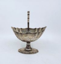 A George III Irish silver "batwing" swing handled pedestal basket, by William Bond, Dublin 1803,