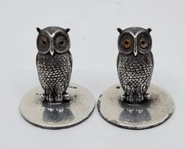 A pair of silver novelty menu holders, by Sampson Mordan & Co, London 1930, fashioned as owls