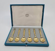 A set of six Jensen sterling silver-gilt Acorn pattern coffee spoons, stamped Georg Jensen oval logo