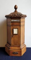 A Victorian brass mounted oak "Country house" hexagonal letter box of J.W.Penfold design, by