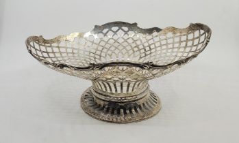 An Austro-Hungarian silver pedestal basket, by Antal Buchruch, of oval form having undulating 'C'