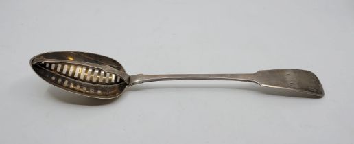 A George IV Irish silver fiddle pattern straining spoon, by William Cummins, Dublin 1820, having