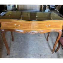 A Victorian revival mahogany serpentine sideboard/console table , raised on cabriole legs. glass