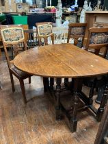 20th century oak dropleaf table with four chairs,in tapestry style fabric table is in good