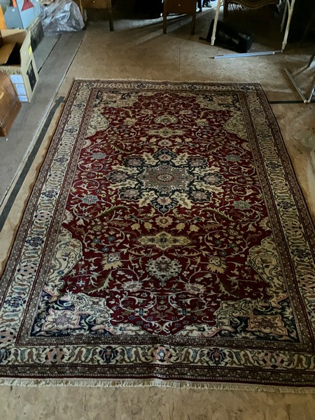 Persian style rug in creams and reds with blue accents 7'3" x 6'1"  aprox