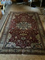 Persian style rug in creams and reds with blue accents 7'3" x 6'1"  aprox