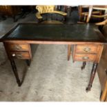 Leather topped Mahogany side/hall table on turned legs over brass castors.  75cms h x 100cms w x