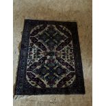 Small blue and cream Persian style / middle eastern rug 3'4" x 32" aprox