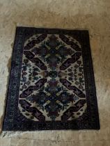 Small blue and cream Persian style / middle eastern rug 3'4" x 32" aprox
