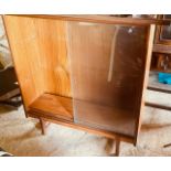 A 20th century mahogany and boxwood bookcase; another glazed bookcase (2)