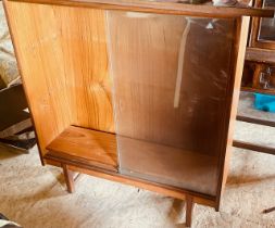 A 20th century mahogany and boxwood bookcase; another glazed bookcase (2)