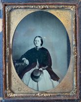 A collection of 16 Victorian daguerreotype, ambrotype and tintype photographs, framed, together with