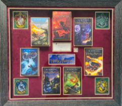 Rowling, J. K. Autograph in bold blue ink, presented with seven paperback copies of the Harry Potter