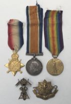 A WW1 1914 star trio, plus cap badges, awarded to 5589 A/Cpl Frederick Henry Sharp of the 12th