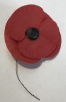 Rear early ‘Haig Fund’ Poppy in good condition with original button Centre and wire suspension.