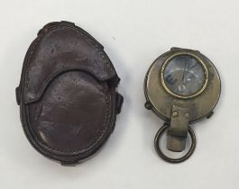 A WW1 Verniers style Compass in brass, with original leather case. In need of some restoration.
