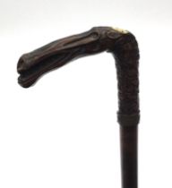 An interesting and scarce, WW1 era Prisoner of War carved walking stick. Fashioned in what appears