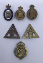 A selection of WW1 Home Front War Service badges. To include: a 1st pattern On War Service badge,